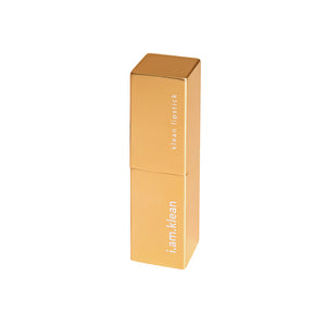 Gesloten gouden verpakking va de Nectar lippenstift van i.am.klean. De verpakking heeft een vierkante vorm. De foto heeft een witte achtergrond. 